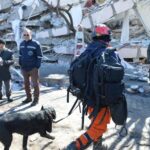 Rescuers carry out rescue operation with rescue dogs in Adiyaman, Turkey, Feb. 8, 2023. The death toll from Monday’s devastating earthquakes in Turkey and Syria has surpassed 17,000, according to latest data. (Photo by Mustafa Kaya/Xinhua)