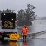Photo taken on July 4, 2022 shows a flooded road in Windsor, New South Wales, Australia. Heavy rainfall across Australia’s southeast coast since Saturday last week has once again inundated Sydney and large parts of southeast New South Wales (NSW) with flash flooding and severe weather. (Xinhua/Bai Xuefei)